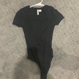 Super trendy black body suit